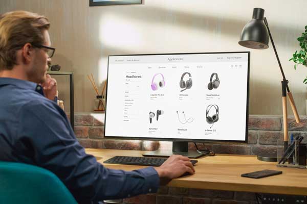 Man Using Desktop Computer, Online Shopping for Electronics
