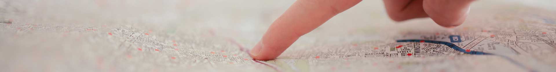 fingers pointing on the map