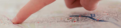 fingers pointing on the map