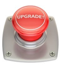 a round red button with word of Upgrade on top
