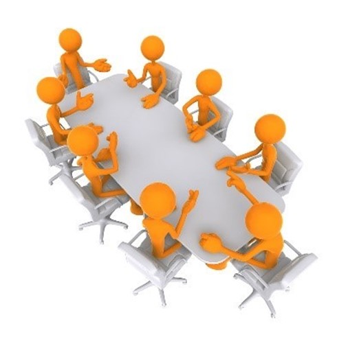 Figures around meeting table