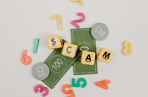 scam word on all kinds of dollar sign